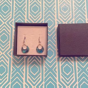 Inlaid aqua blue stone look. In silver short hang ear ring.